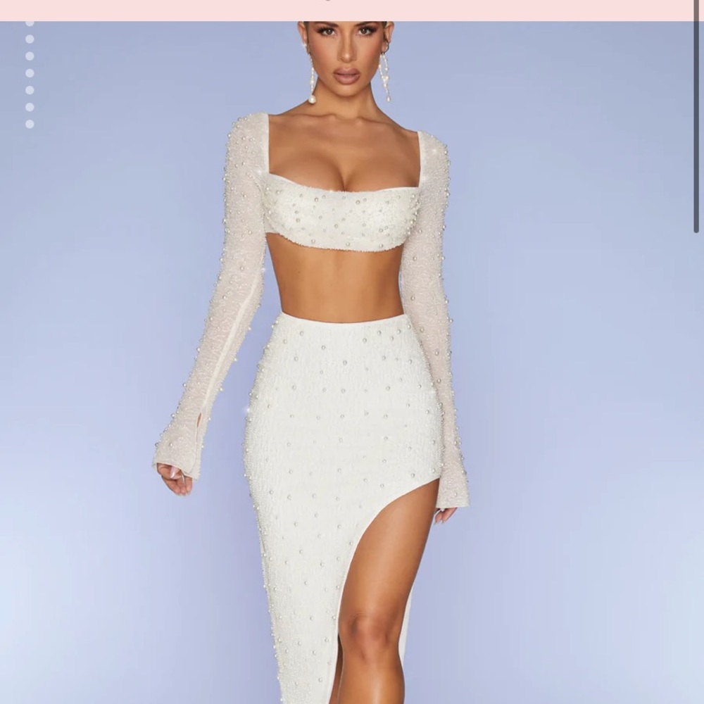 Selling this Oh Polly set. Never worn, tags still on. Top & shirt included.